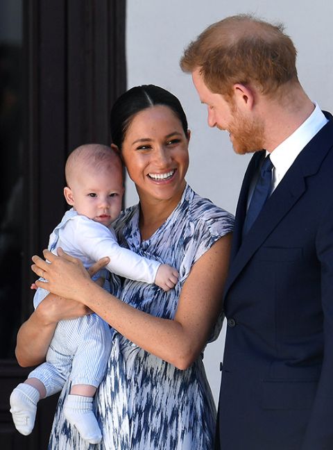 Prince Harry and Meghan Markle with their son 